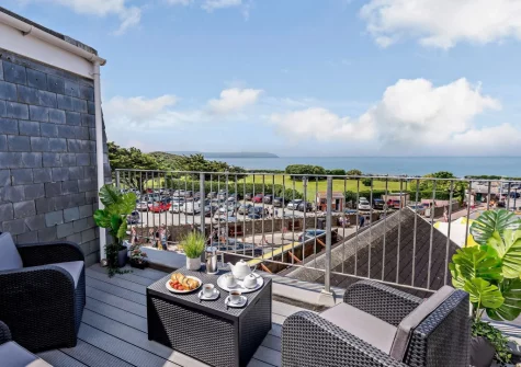 The decked balcony & outdoor sitting area at The Horseshoe, Woolacombe