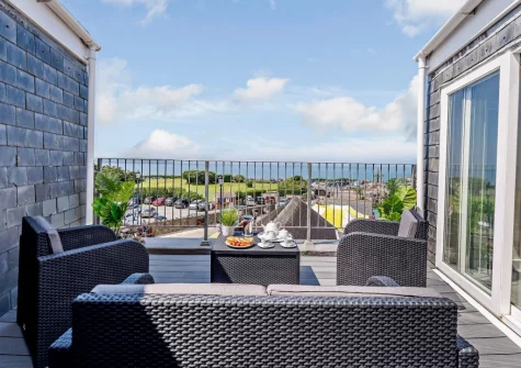 The decked balcony & outdoor sitting area at The Horseshoe, Woolacombe