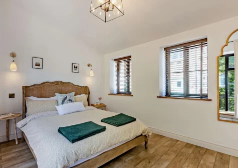 The bedroom at The Italian Stables, Woodtown