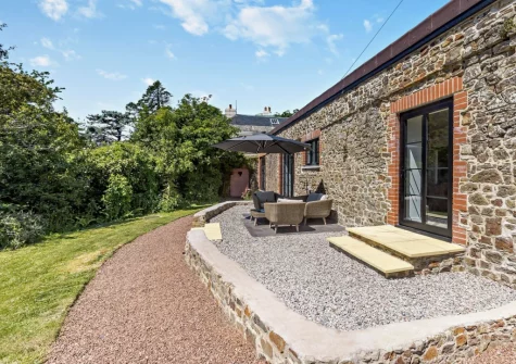 The patio, outdoor sitting area & garden at The Italian Stables, Woodtown
