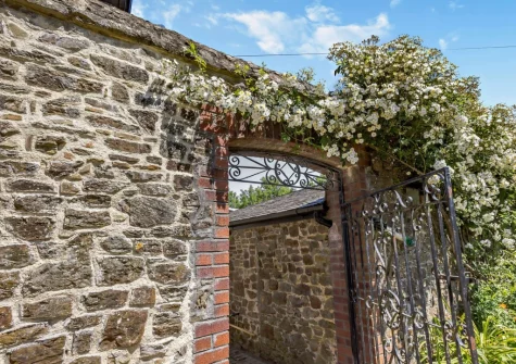 The Italian Stables is a perfect rural bolthole that's stylishly decorated with charming flooring, large windows & elegant furnishings