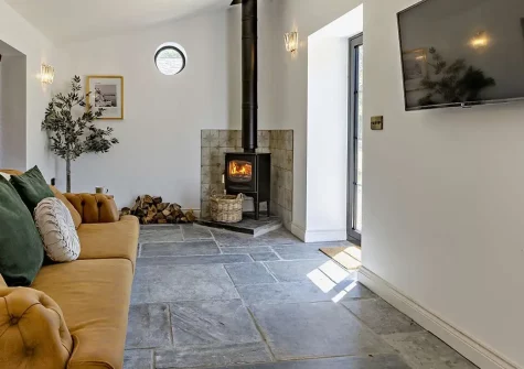 The Italian Stables, Woodtown is an enchanting barn conversion offering a stylish and intimate retreat for two, nestled amid the North Devon countryside. Enjoy a private walled garden, fire pit, and easy access to stunning beaches and attractions.