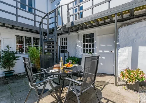 The courtyard & alfresco dining area at The Kellan, Mousehole