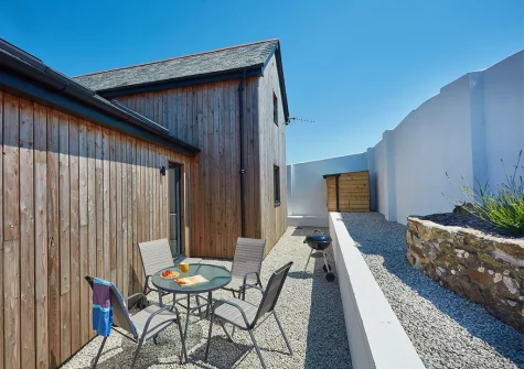 The alfresco dining & barbecue area at The Larches, Presingoll Barns, St Agnes