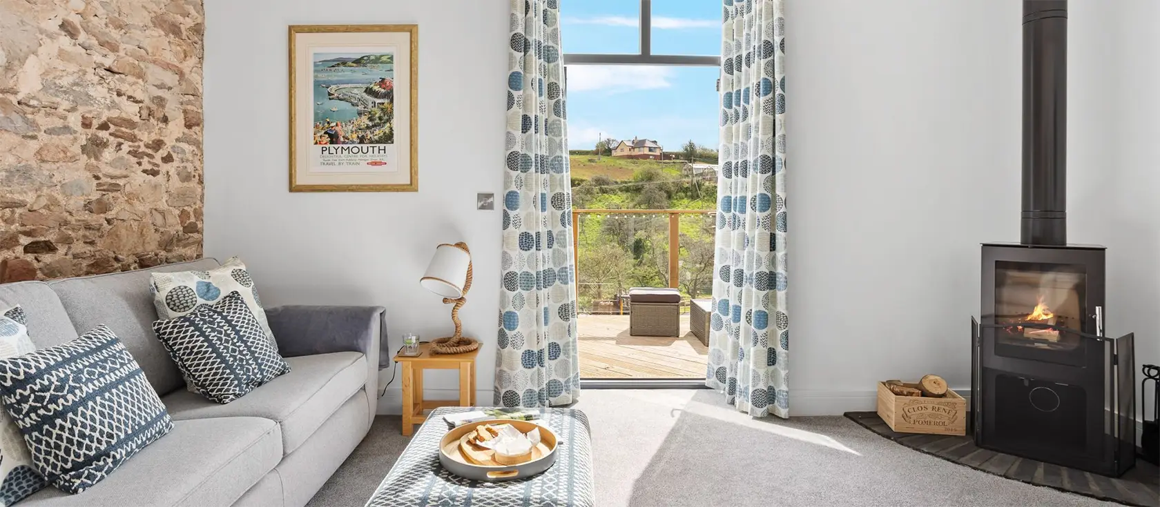 The Linhay, Higher Yalberton Farm, Yalberton, is a luxurious 4-bedroom barn conversion in Devon's countryside, perfect for families with a private hot tub and scenic views. Located in a tranquil setting, it's close to beaches, towns, and attractions.