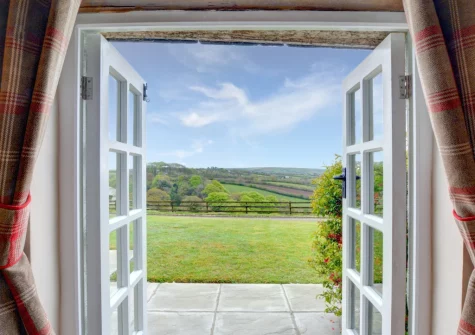 Step out on to the patio & lawned garden
