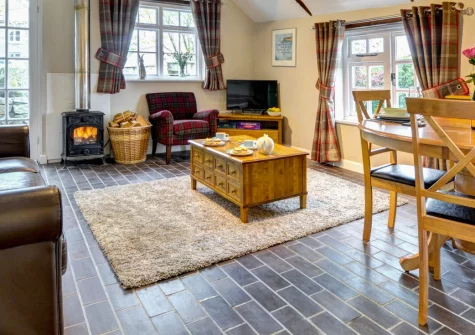 The Linney at Penrose Burden, St Breward is a romantic barn conversion for two, featuring a wood burner, countryside views, a private patio and a Hypnos bed, set amid secluded Cornish fields near Bodmin Moor, perfect for walkers and cyclists.