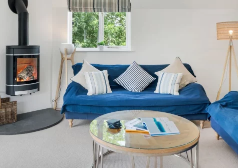 The Little Hawthorns, Polzeath is a spacious three-bedroom reverse-living home near Roserrow, with a sunny south-facing terrace, wood-burning stove, large garden and easy access to Polzeath's beaches, golf club and North Cornwall's coastline.