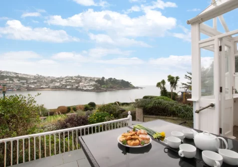 The patio, alfresco dining are & garden at The Lodge at Kylgenna, Fowey