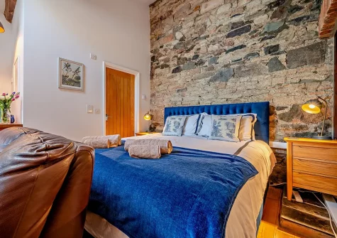 The sleeping area at The Loggin, Trebudannon