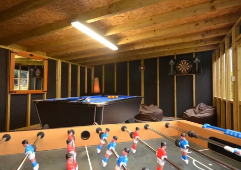 The shared games room at The Loggin, Trebudannon
