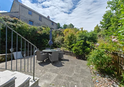The enclosed patio, barbecue & alfresco dining area at The Long Barn, St Ervan