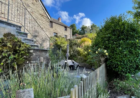 The enclosed patio, barbecue & alfresco dining area at The Long Barn, St Ervan