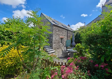 The enclosed patio, barbecue & alfresco dining area at The Long Barn, St Ervan