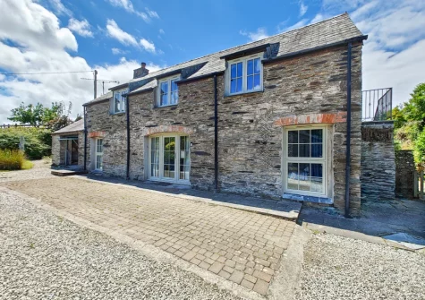 The Long Barn is a beautiful, upside-down converted stone barn nestled in the peaceful picturesque hamlet of St Ervan