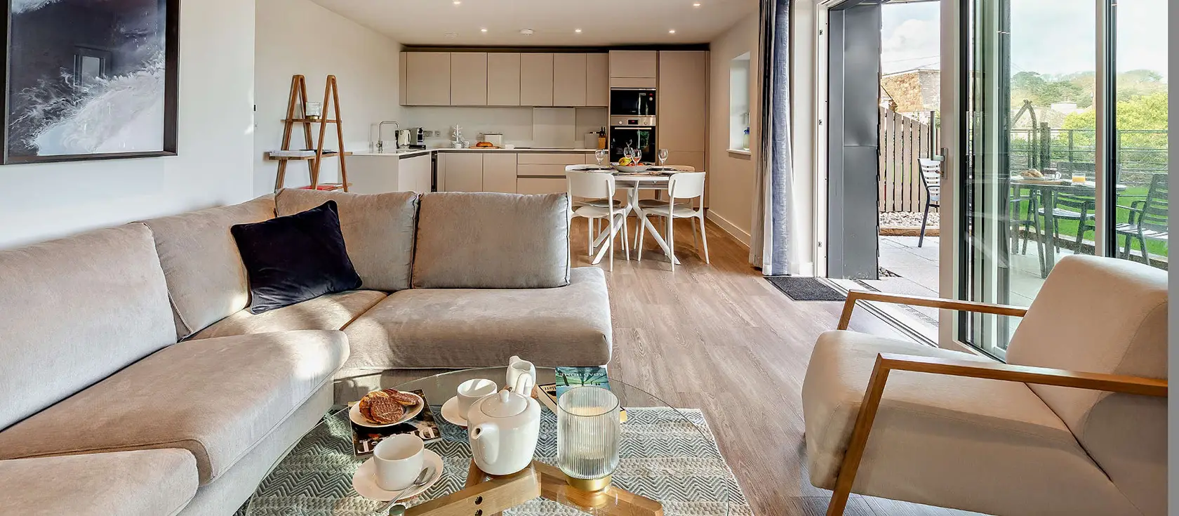 The Longstore, Padstow is a luxurious two-bedroom estuary-view apartment with private garden. Enjoy breathtaking harbour views, sophisticated coastal styling, and easy access to Cornwall's finest attractions and beaches from this prime location.