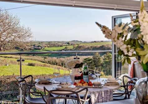 The enjoy far reaching countryside views from the dining area at The Lookout, Crafthole