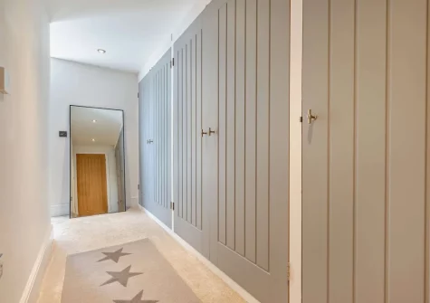 Bedroom #1 six metre fitted wardrobe & dressing area  at The Lookout, Crafthole