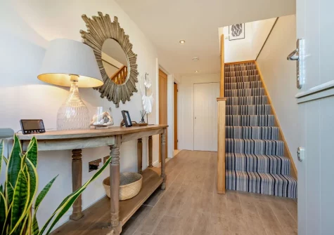 The entrance hallway & stairs up to the first floor at The Lookout, Crafthole