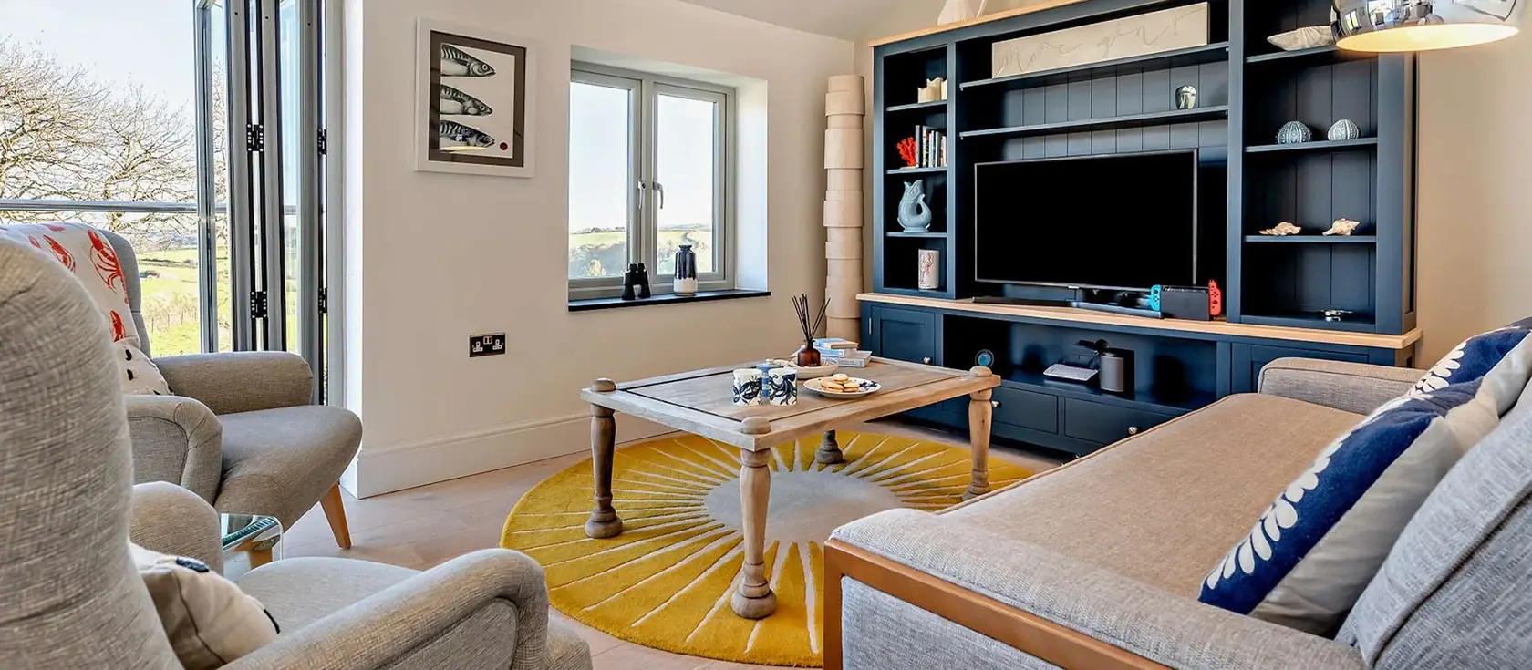 The Lookout, Crafthole offers luxury barn conversion living with stunning countryside views, complimentary kayak access, and beautifully styled high-end interiors. Perfect for exploring Cornwall's treasured south coast attractions and beaches.