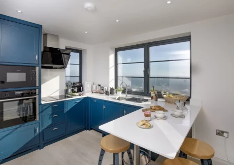The kitchen with breakfast bar dining area at The Lookout Tower, Beer