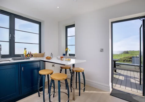 The kitchen with breakfast bar dining area at The Lookout Tower, Beer