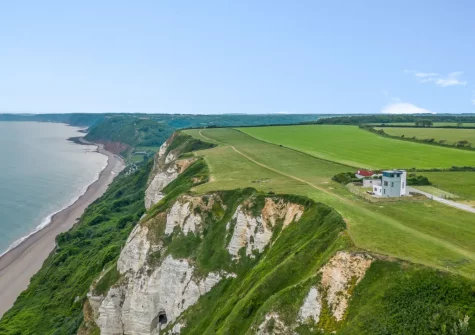 The Lookout Tower in its commanding position, sitting proudly on the top of Beer Head Cliffs with he South West Coast Path passing in front