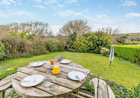 The terrace, alfresco dining & enclosed garden at The Lookout, Treen