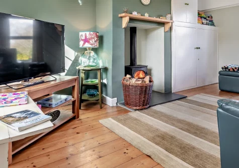 The Lookout, Treen is a charming Cornish cottage on the edge of the beautiful Penberth Valley, featuring a large enclosed garden with bluebell walk, cosy wood burner, and easy access to the dramatic South West Coast Path and stunning beaches.