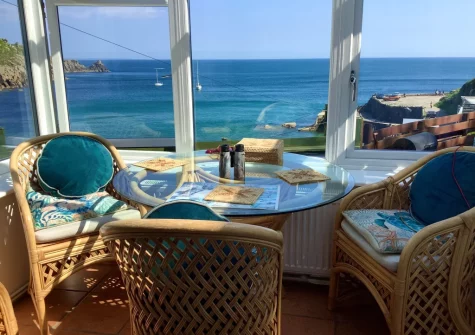 The conservatory dining area at The Magazine, Lamorna