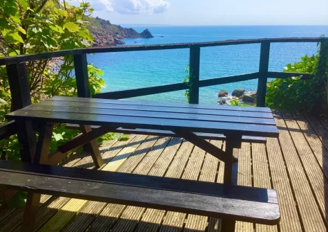The decked terrace & alfresco dining area at The Magazine, Lamorna