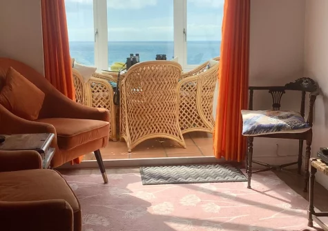 The Magazine, Lamorna is a charming former dynamite store turned cosy coastal cottage, perched above Lamorna Cove with sweeping sea views, sub-tropical gardens, a wood burner, and easy access to Cornwall's finest beaches, coves and villages.