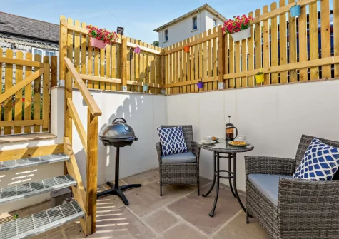 The enclosed courtyard at The Meeting Room, Beer