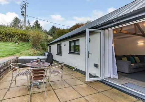 The patio, barbecue area & alfresco dining area at The Milking Shed, Bittadon