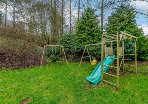 The shared gardens & children's play area at The Milking Shed, Bittadon