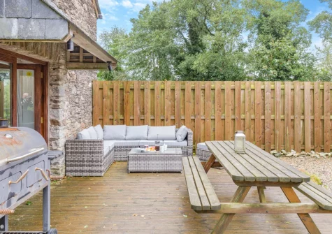 The patio, barbecue, alfresco dining & outdoor sitting area at The Moohey, Downderry