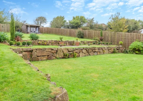 The large enclosed lawned garden at The Moohey, Downderry