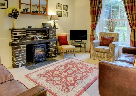 The Mount, Crugmeer is a charming detached cottage nestled in tranquil Cornish countryside. Enjoy characterful stone fireplace, beamed ceilings, and large garden with distant sea views. Its' a perfect family coastal retreat near to Padstow.