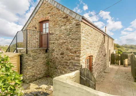 The courtyard patio, barbecue & alfresco dining area at The Mowhay, Penvose Farm, Tregurrian