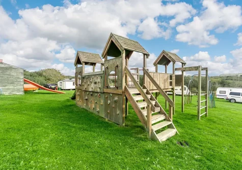 The shared children's play area at Penvose Farm, Tregurrian