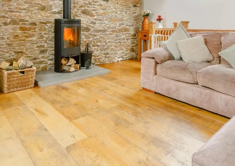 The Mowhay, Penvose Farm, Tregurrian is a converted three-bedroom barn with upside-down living, wood burner, and enclosed patios. Just minutes from Cornwall's finest beaches, it offers rustic charm with modern comforts for the perfect coastal break.