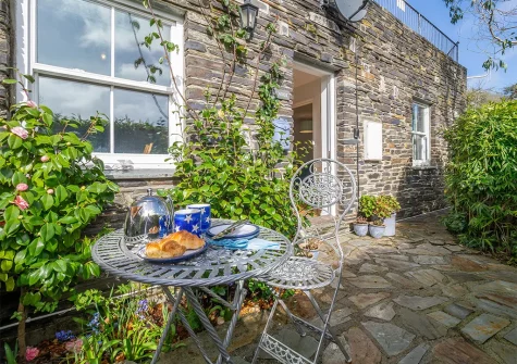The patio & barbecue area at The Nook, Malpas