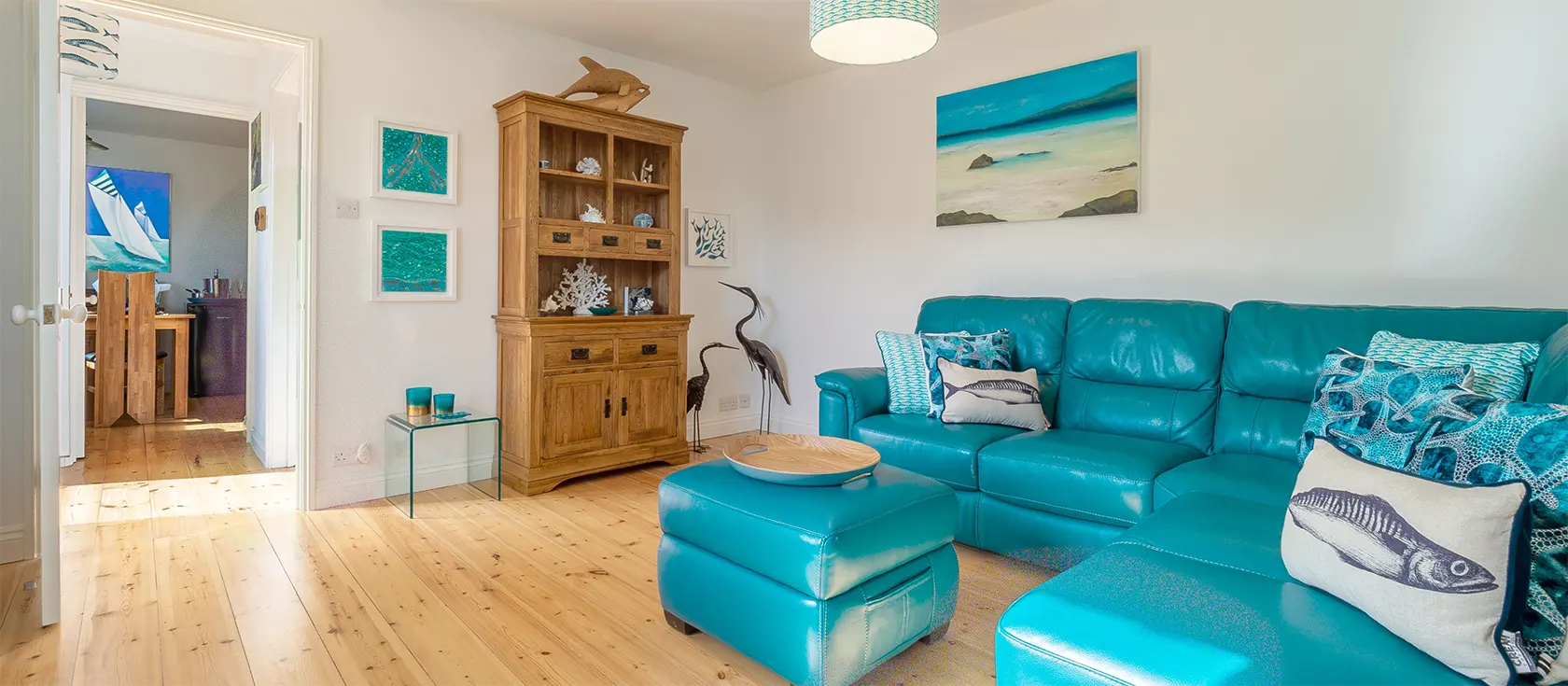 The Nook, Malpas is a charming one-bedroom cottage perfect for a romantic break. The lovely spacious rooms are decorated with comfortable furniture and characterful splashes of seaside blue, and it comes with a courtyard and allocated parking.