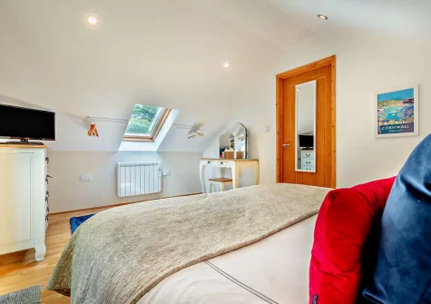 The bedroom at The Nook, Trebudannon