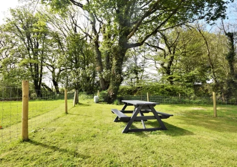 The enclosed garden & alfresco dining area at The Nuthatch, Higher Clovelly