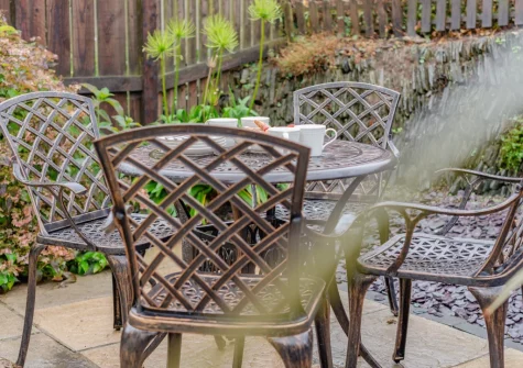 The enclosed patio garden & alfresco dining area at The Nutshell, Padstow