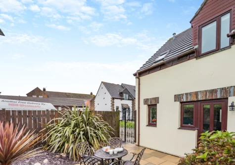 The enclosed patio garden & alfresco dining area at The Nutshell, Padstow