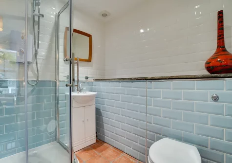 Bedroom #2 en-suite shower room at The Old Bakery Flat, St Ives