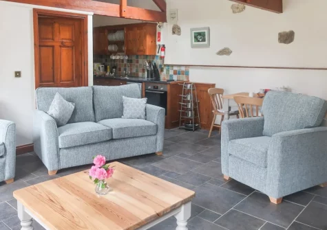 The living area & kitchen at The Old Cart House, Lanivet