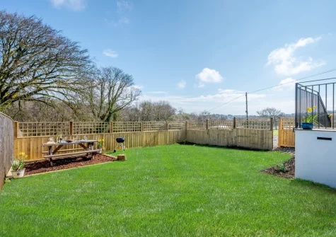 The barbecue, alfresco dining area & enclosed garden at The Old Cattle Shed, Altarnun